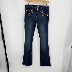 Caché Y2K-style dark wash flare jeans gold stud embellishments front pockets 2
